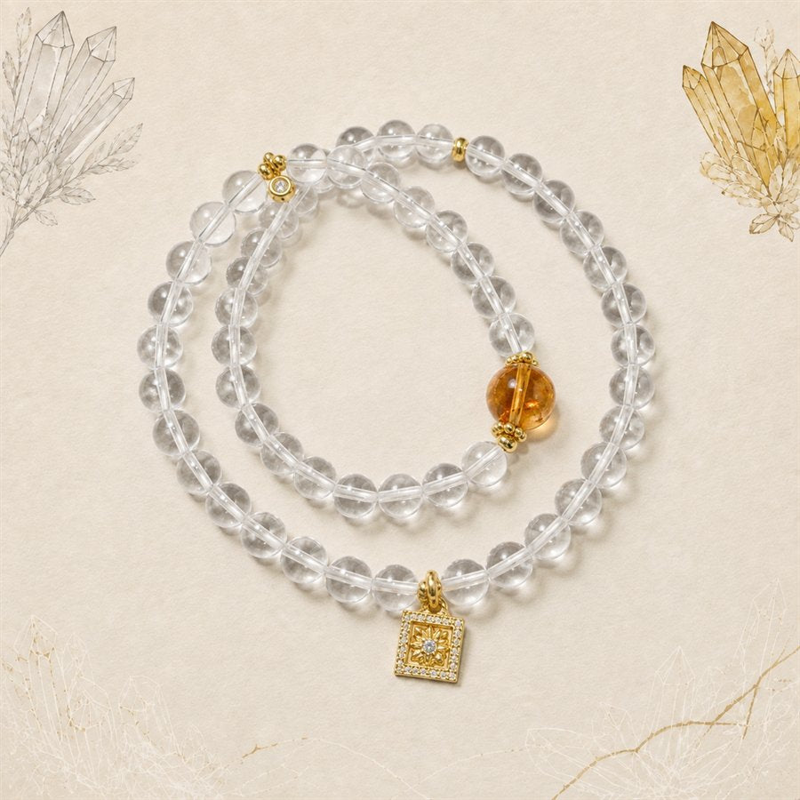Inner Horizon clear quartz and yellow tower quartz double-wrap bracelet on an archival mineral background