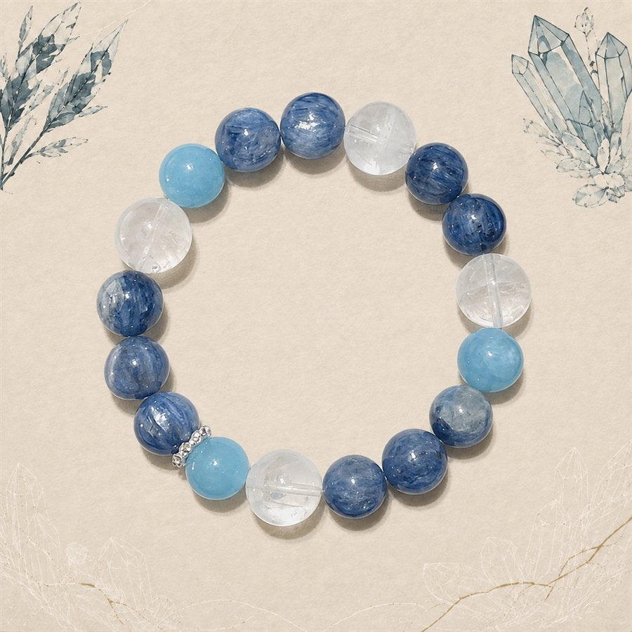 Kyanite, aquamarine and white phantom quartz bracelet on an archival mineral background